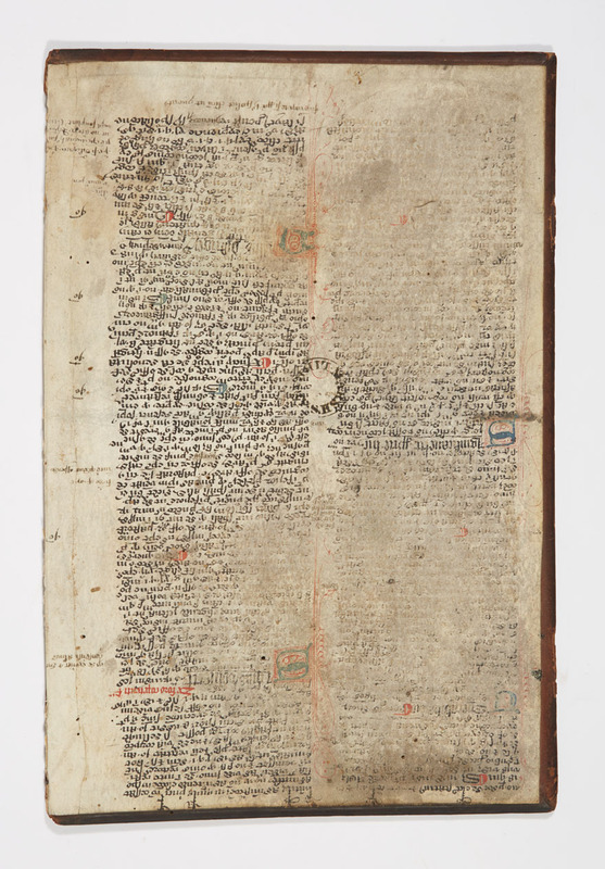 Damaged fragment of a manuscript pasted into the binding